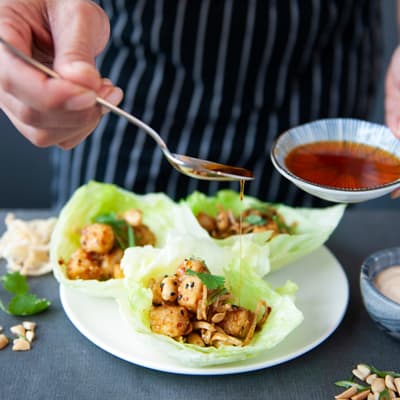 Sweet and spicy Szechuan tofu, peanuts, wontons, korean chili sauce, spicy yogurt.