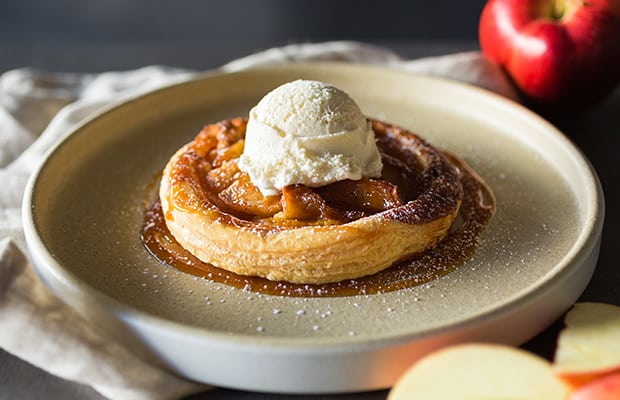 flaky puff pastry, caramelized apples, tahitian vanilla ice cream, caramel sauce.